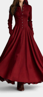 Mahaute long burgundy faux suede shirt dress with a structured collar, button-down front, and a flared skirt.