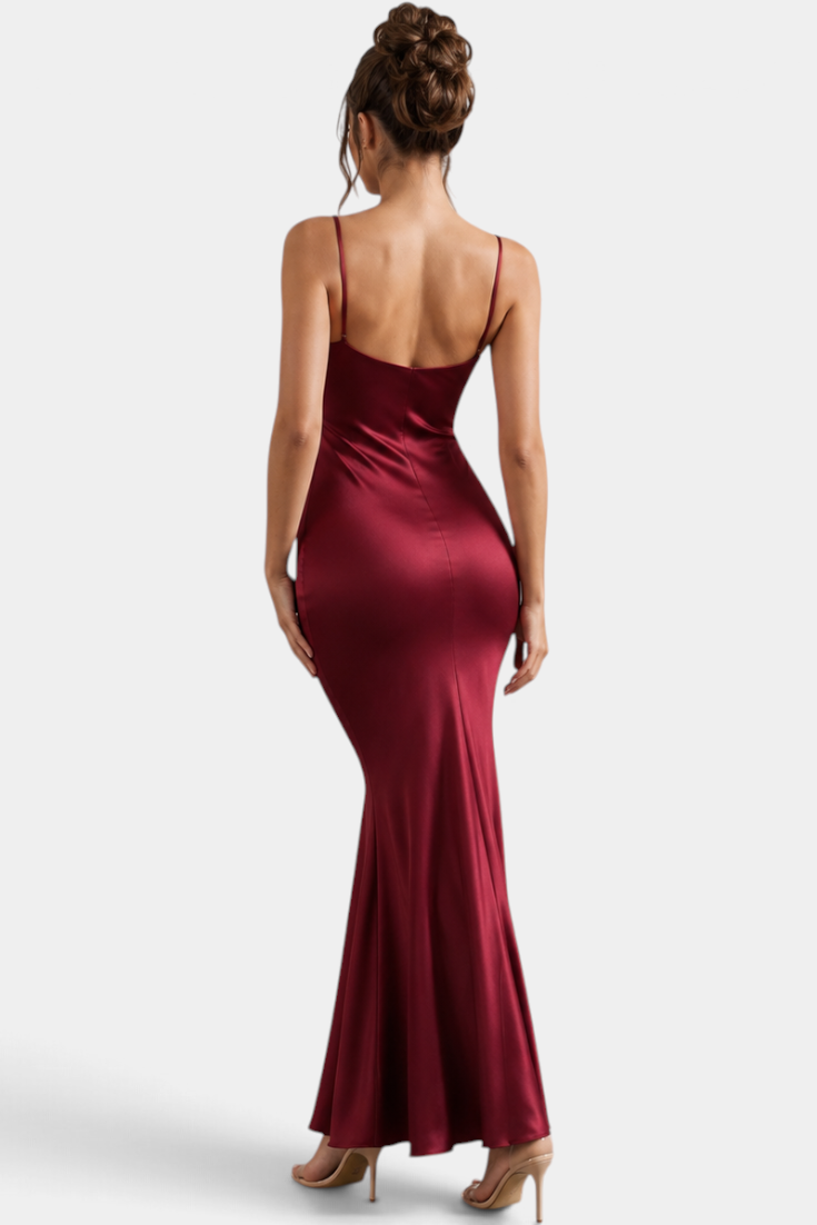 Mahaute long burgundy satin evening gown with thin straps and back view on a model wearing high heels