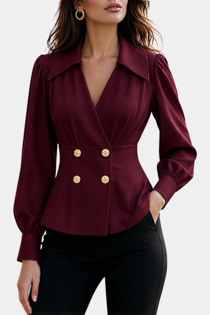 Mahaute burgundy tailored blouse with crossover neckline, cinched waist, and decorative gold buttons.
