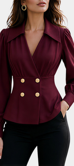 Mahaute burgundy tailored blouse with crossover neckline, cinched waist, and decorative gold buttons.