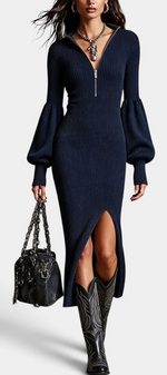 Mahaute Calyra navy ribbed knit midi dress with balloon sleeves, zip collar, and front slit worn with cowboy boots.