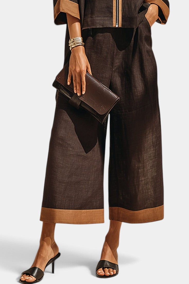 Ensemble Mahaute Candelaria avec veste zippée marron et pantalon large 7/8 contrasté, vue de face.