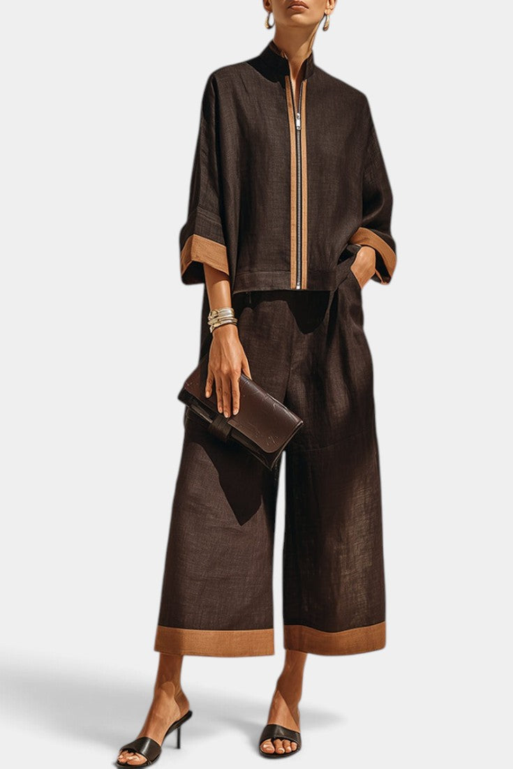 Ensemble Mahaute Candelaria avec veste zippée et pantalon large 7/8 contrasté, style décontracté et moderne, couleur marron.