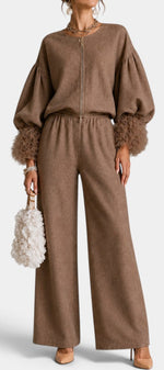 Mahaute Carrie brown zip-up set with voluminous puff sleeves, textured cuffs, and wide-leg trousers on a model.