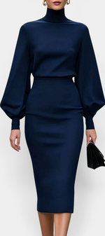 Mahaute Celandine navy blue midi dress with a high neck, voluminous balloon sleeves, and a fitted pencil skirt.