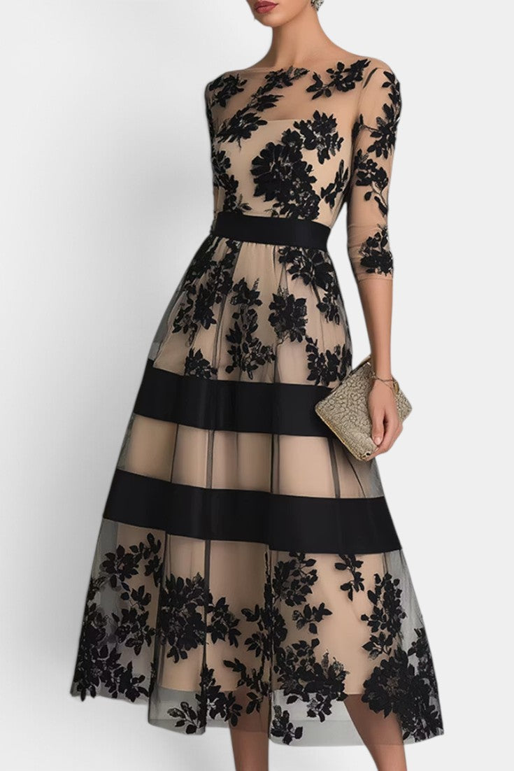 Robe mi-longue Mahaute Celia en tulle brodé floral à manches 3/4, élégante et légère, idéale pour les occasions spéciales.