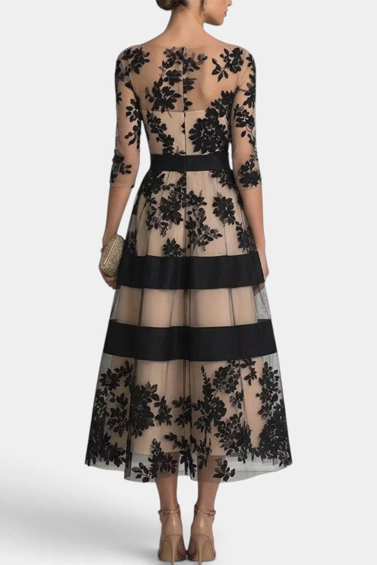 Robe mi-longue Mahaute Celia en tulle brodé floral avec manches 3/4, élégante et légère, vue de face.