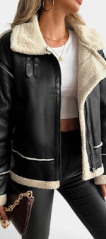 Mahaute Clarimonde black faux leather aviator jacket with cream faux shearling collar and buckled strap details