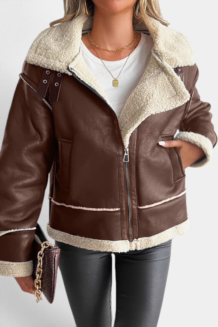 Mahaute Clarimonde brown faux leather aviator jacket with cream faux shearling collar, zip closure, and buckle straps.