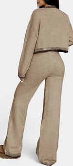 Mahaute Clemency beige knit lounge set with contrast striped trim on the cardigan and wide-leg trousers, back view.