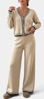 Mahaute Clemency beige knit lounge set featuring a V-neck cardigan with gold buttons and wide-leg trousers.