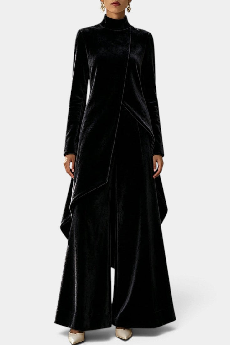 Mahaute Cosima black velvet two-piece set featuring an asymmetrical tunic with high neck and wide-leg trousers