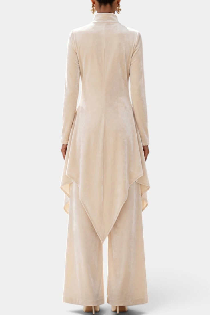Mahaute Cosima velvet ensemble featuring a beige high-neck asymmetrical tunic and wide-leg trousers, back view.