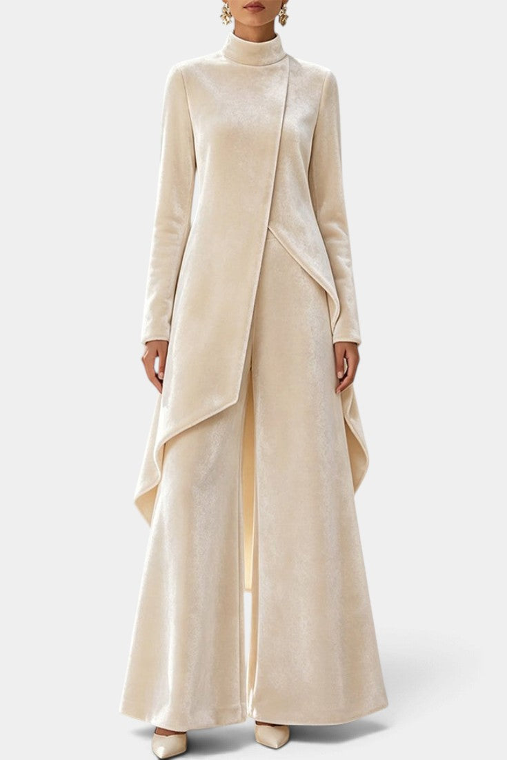 Mahaute Cosima cream velvet set featuring an asymmetrical tunic with high neck and matching wide-leg trousers.