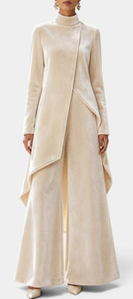 Mahaute Cosima cream velvet set featuring an asymmetrical tunic with high neck and matching wide-leg trousers.