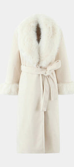 Mahaute long cream coat with a faux fur collar and cuffs, featuring a tie belt for a sophisticated winter silhouette.