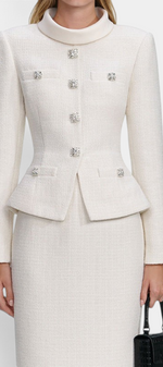 Mahaute Gergana cream structured skirt suit with a high collar and sparkling jewel buttons on the fitted jacket.