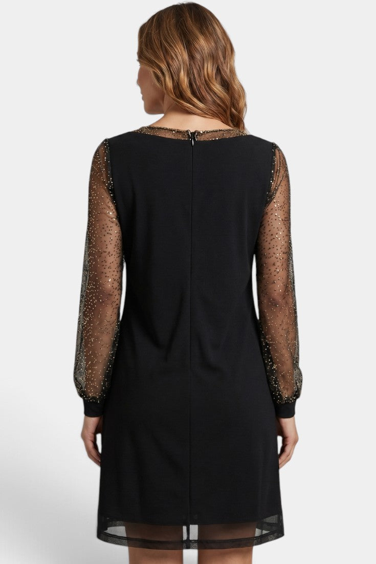 Robe courte noire Mahaute Crisanta avec décolleté en V, manches transparentes à sequins, élégante et brillante.