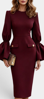 Mahaute Demelza burgundy midi sheath dress with flared sleeves and gold button flap details on a model