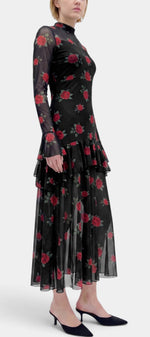 Robe longue Églantine Mahaute à imprimé roses, manches transparentes et volants, style élégant et floral.