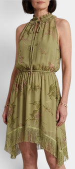 Mahaute Eglantine midi dress in sage green chiffon with a pleated halter neck, bow detail, and asymmetric fringed hem.