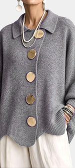Mahaute Eleri grey oversized knit cardigan with a shirt collar, balloon sleeves, and large gold buttons.