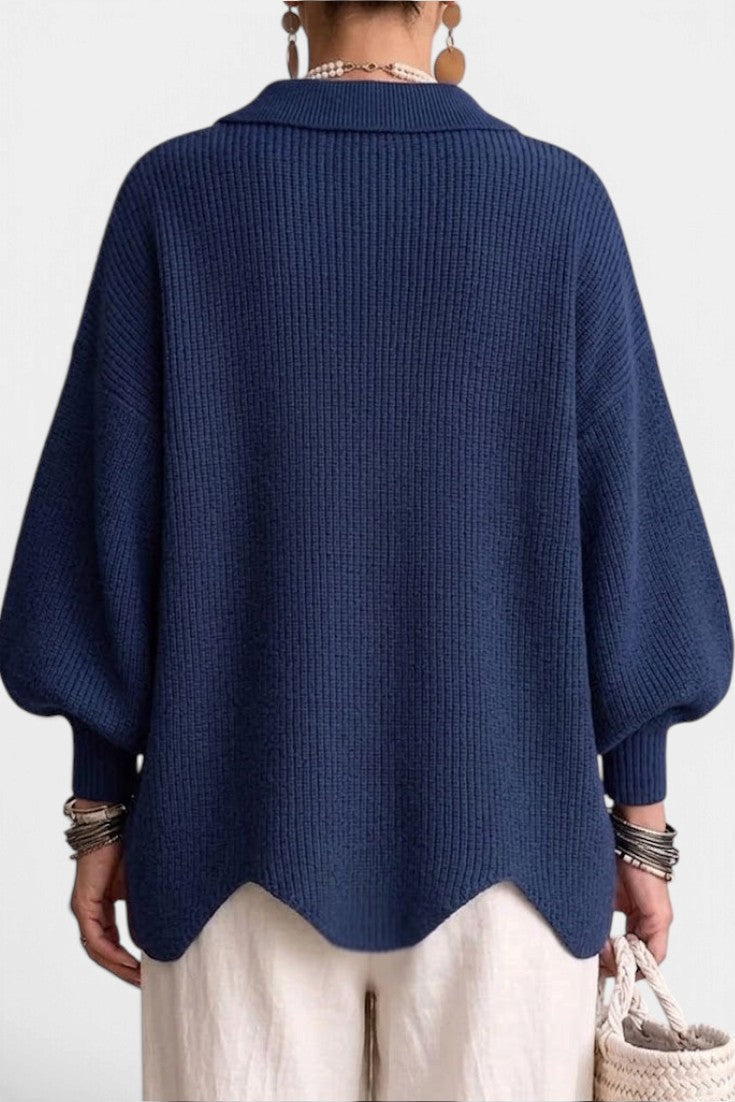 Back view of Mahaute Eleri navy blue oversized knit cardigan with a shirt collar and scalloped hem