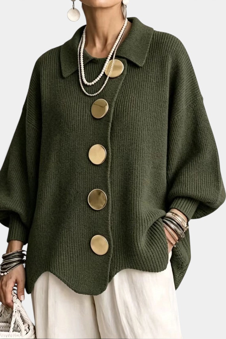 Mahaute Eleri oversized olive green knit cardigan with a shirt collar, balloon sleeves, and large gold buttons.