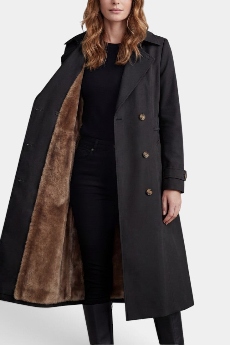 Mahaute Ermelinde trench long noir avec doublure effet fourrure, ceinturée et double boutonnage, veste élégante en tissu.
