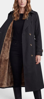 Imperméable long Mahaute Ermelinde avec ceinture, doublure effet fourrure et double boutonnage, style trench élégant noir.