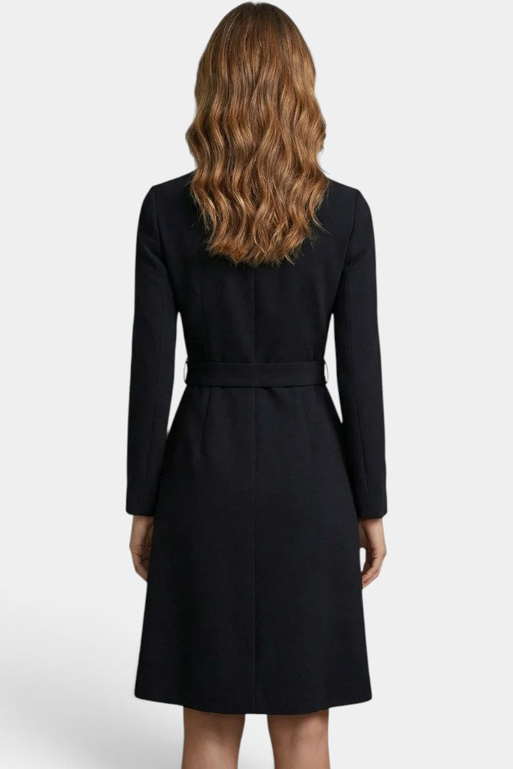 Back view of Mahaute Estée black midi wrap dress with long sleeves and a belted waist.