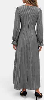 Back view of Mahaute Ethelinde long black and white gingham dress with long puff sleeves and ruffled cuffs