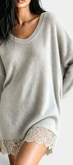 Mahaute Ethelreda oversized knit sweater dress in light grey with a scoop neckline and delicate floral lace hem.