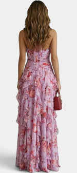 Robe longue fleurie Mahaute, dos nu avec volants cascade, tissu léger et élégant, parfaite pour les occasions estivales.