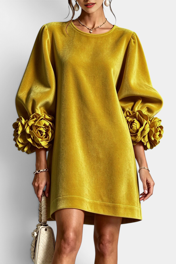 Mahaute Fuega short mustard velvet dress with voluminous puff sleeves and 3D floral details at the cuffs.