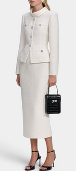 Mahaute Gergana cream tweed skirt suit with structured jacket, jewel buttons, and midi skirt on a model