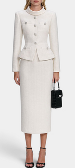 Mahaute Gergana cream tweed skirt suit with a structured peplum jacket, high collar, and sparkling jewel buttons.