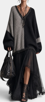 Mahaute Gingelle long two-tone knit and voile dress with V-neck, lace trim, and flowing skirt on a model