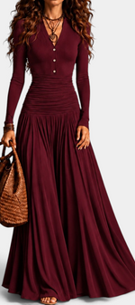 Mahaute Gracia long burgundy dress with V-neck, buttoned bodice, ruched waist, and flowing skirt on a model.