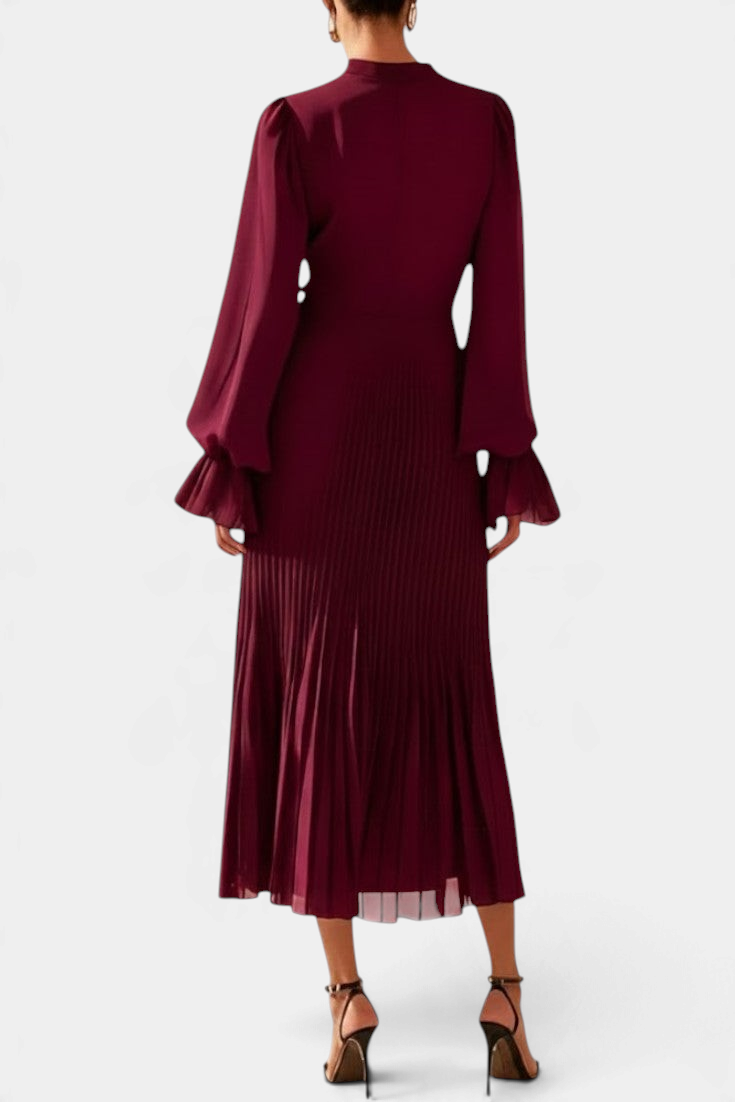 Mahaute Graziella burgundy chiffon midi dress with pleated skirt, lantern sleeves, and high neck, back view.