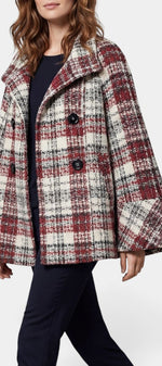 Manteau court à carreaux Mahaute Gudule, col montant et double boutonnage, style élégant et tendance.