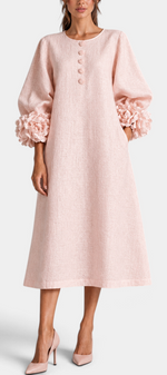 Mahaute Ikavy blush pink midi dress with puff sleeves and 3D floral cuffs, featuring decorative front buttons.