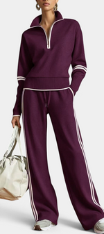 Mahaute Ismay plum knit set with zip-up collar, wide-leg trousers, and white contrast stripes on a model.