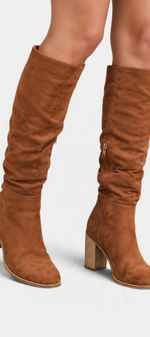 Mahaute Ivya brown knee-high boots with a slouchy suede-effect finish, rounded toe, and stable block heel.
