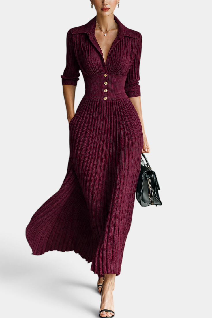 Mahaute Jessamine long burgundy ribbed knit dress with shirt collar, cinched waist, and gold buttons on a model