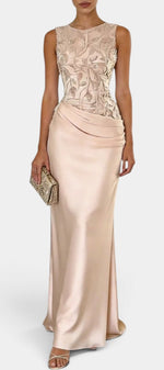 Mahaute Joni sleeveless evening gown with floral embroidered bodice and draped satin floor-length skirt in champagne