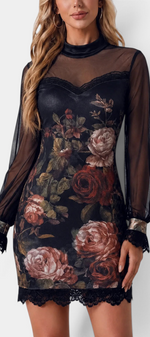 Mahaute Kessy short floral dress with high neck, sheer long sleeves, and delicate black lace trim details.