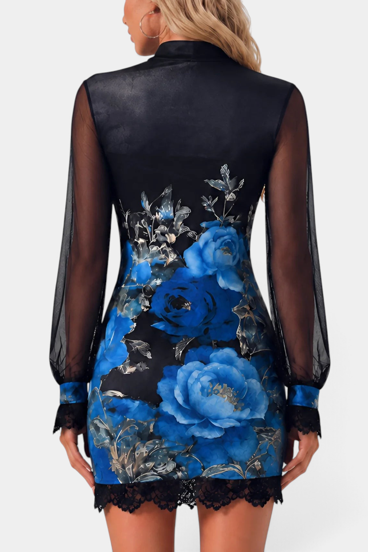 Back view of Mahaute Kessy short floral dress with black sheer sleeves, high collar, and delicate lace trim.