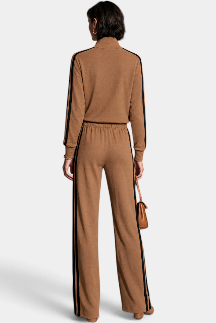 Back view of Mahaute Kimi camel set featuring a buttoned jacket and wide-leg trousers with black side stripes