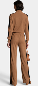 Back view of Mahaute Kimi camel set featuring a buttoned jacket and wide-leg trousers with black side stripes